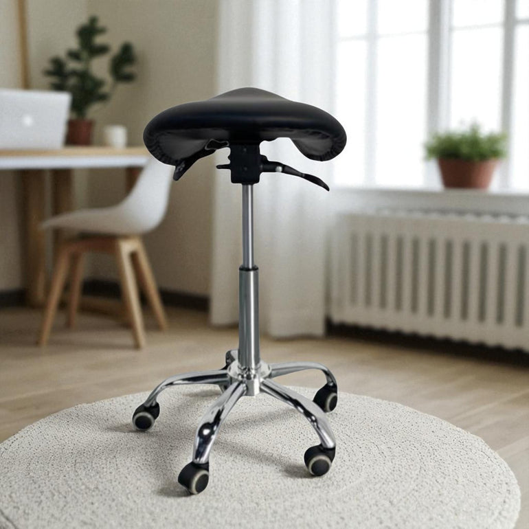 Saddle-style stool with adjustable height in a home office setting